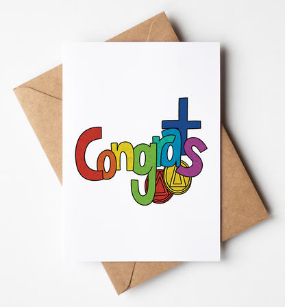 A white greeting card with the word 'Congrats' spelled in colorful playful letters, placed on top of a brown kraft envelope against a clean white background.